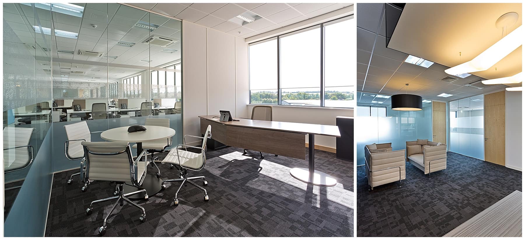 Executive office with white round table and chairs and corner desk