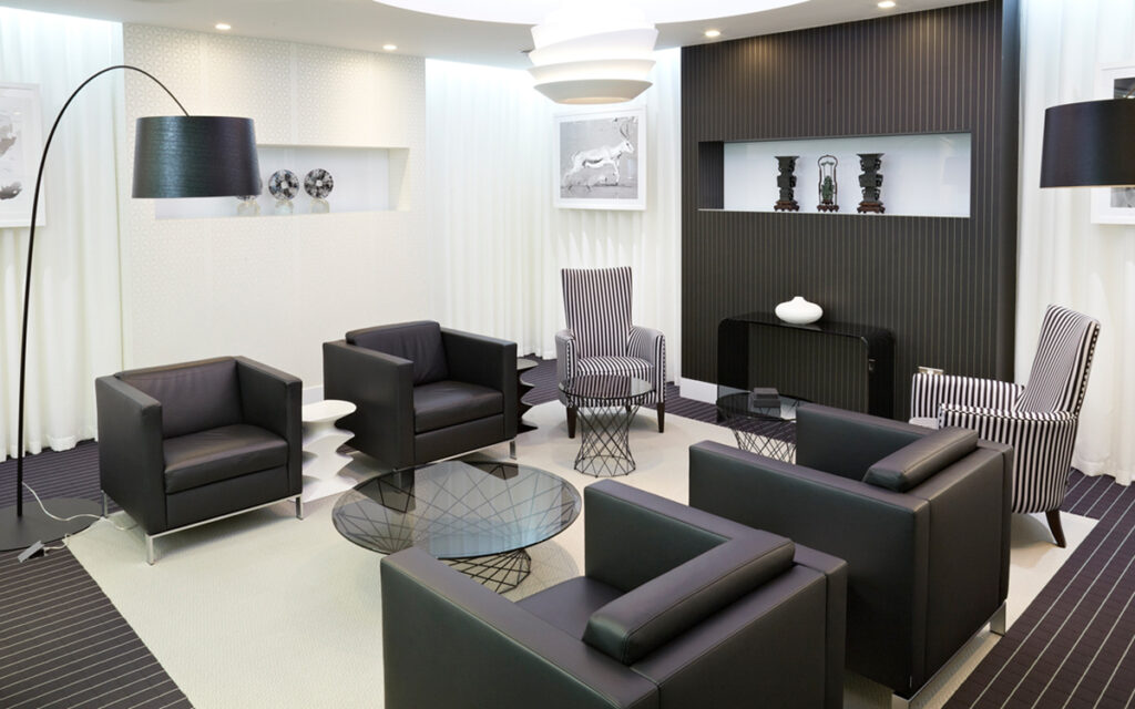 smart executive office with black furniture and stripy theme