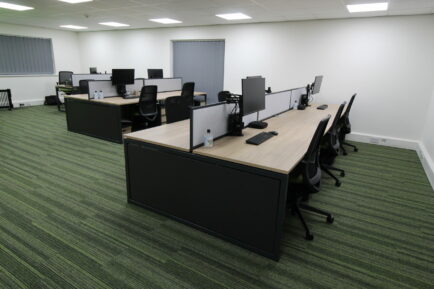 open plan office with desks and chairs